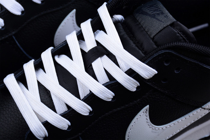 nike dunk low surF**es in black and white dj6188-002